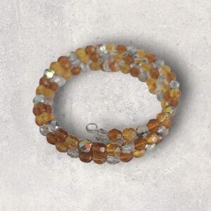 Gold and Silver Coiled Bracelet with Double-Wrapped Design